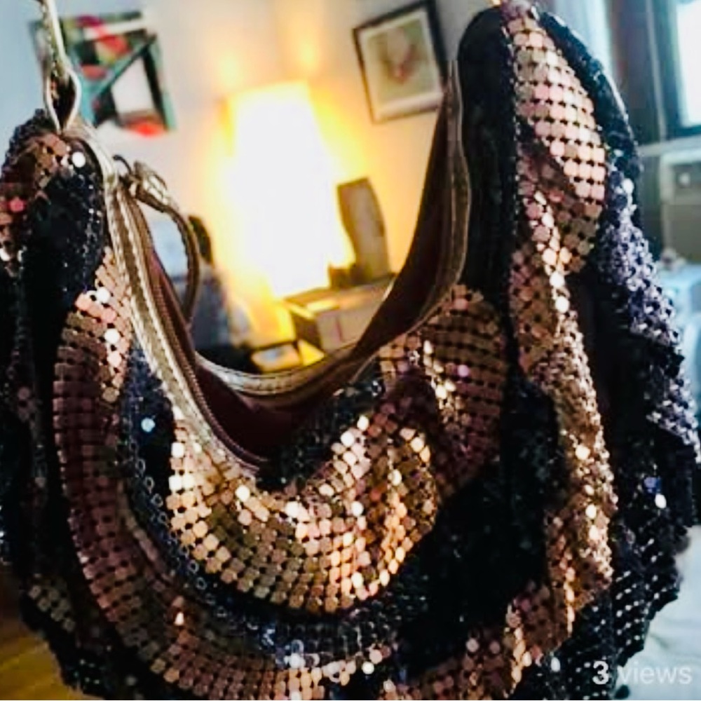 Bebe Sm evening bag. 
Made of brown & bronze metal mesh.